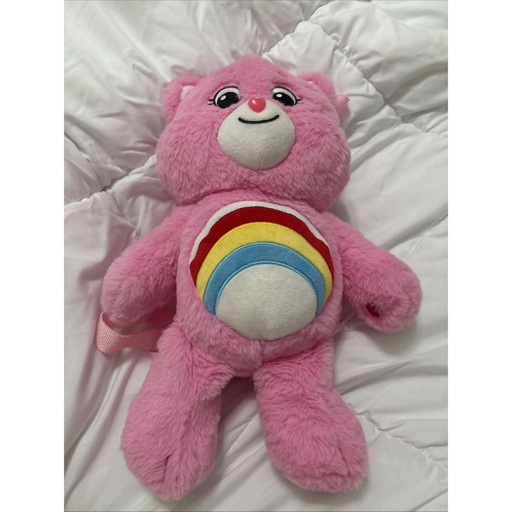 Dolls Kill x Care Bears Cheer Rainbow Plush Backpack - Pink